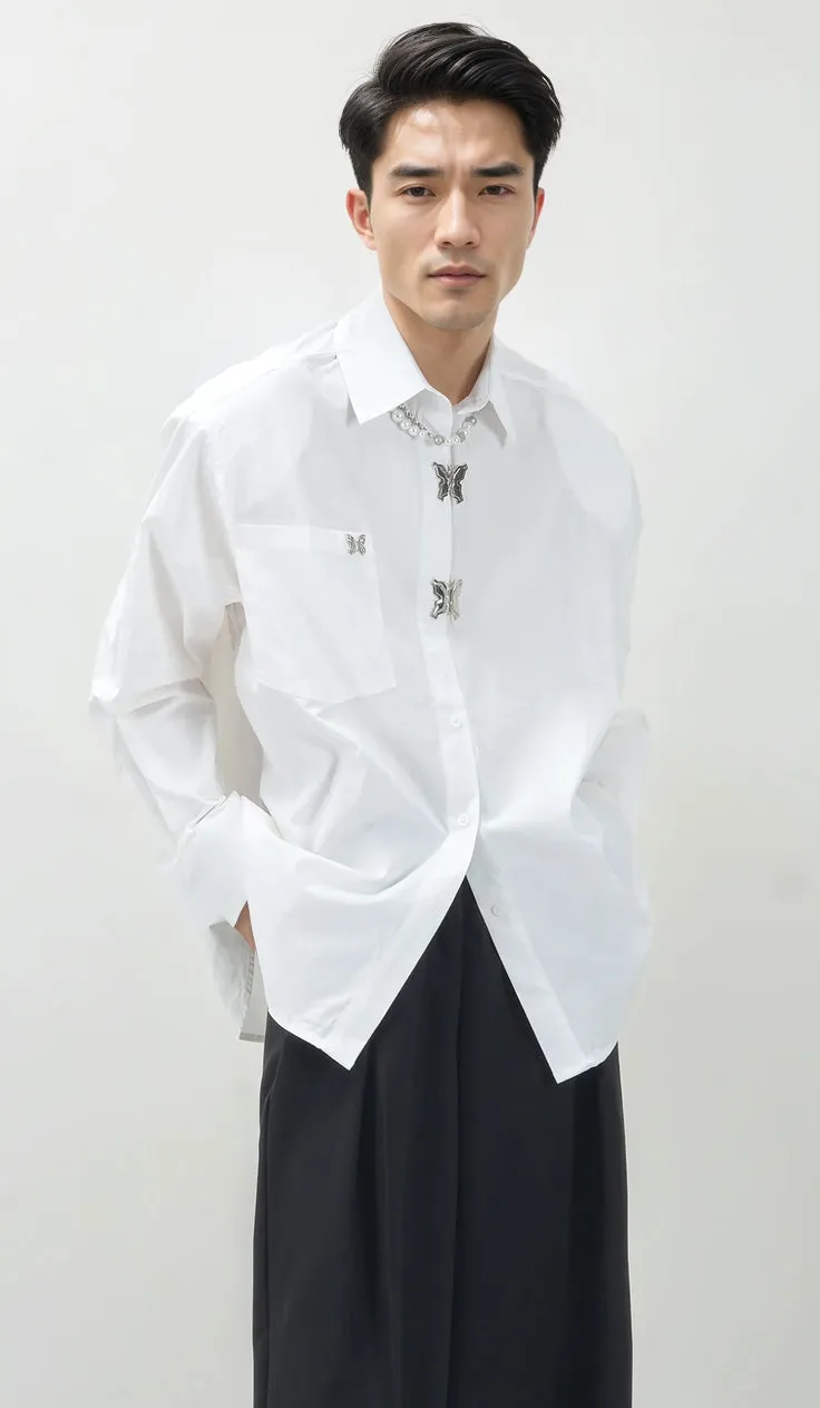 Oversized Shoulder-Padded Shirt with Metallic Brooch Accents